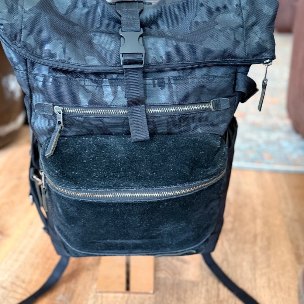 Tumi backpack camo nylon and  cow suede